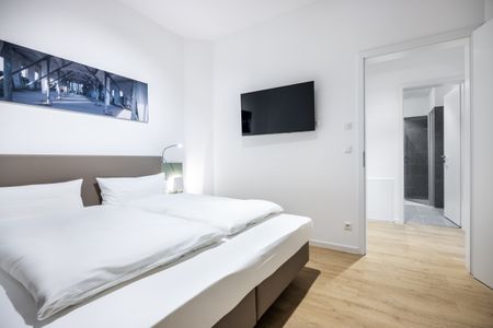 Krusespeicher Krusespeicher 3-47 Wismar - Schlafzimmer mit Doppelbett und TV