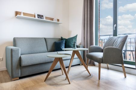 Krusespeicher Krusespeicher 6-74 Wismar - Wohn-Essbereich mit Couch