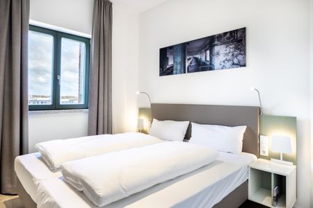 Krusespeicher Krusespeicher 4-56 Wismar - Schlafzimmer mit Doppelbett