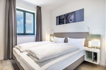 Krusespeicher Krusespeicher 5-64 Wismar - Schlafzimmer mit Doppelbett