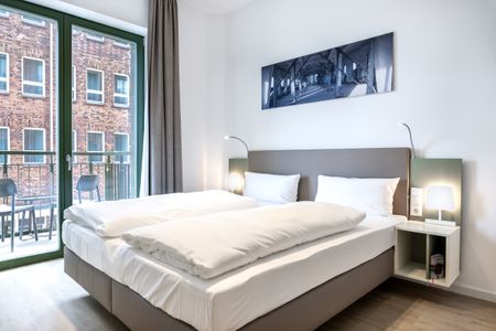 Krusespeicher Krusespeicher 2-36 Wismar - Schlafzimmer mit Doppelbett