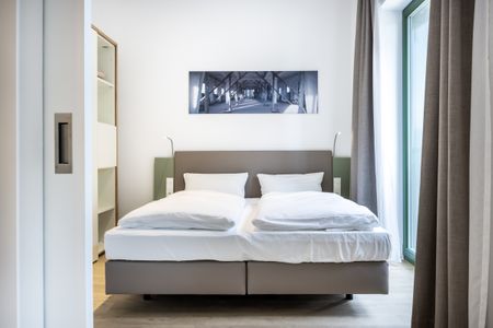 Krusespeicher Krusespeicher 2-37 Wismar - Schlafzimmer mit Doppelbett