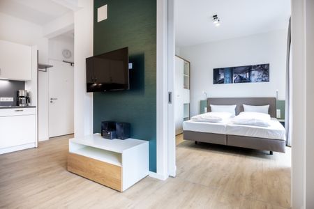 Krusespeicher Krusespeicher 4-53 Wismar - Wohn-Essbereich mit Flatscreen-TV