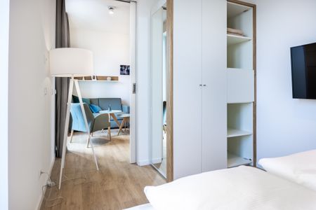 Krusespeicher Krusespeicher 6-69 Wismar - Schlafzimmer mit Doppelbett und Kleiderschrank