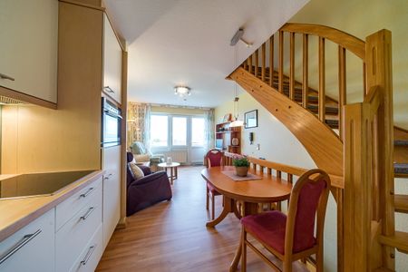 Hus Strandkieker Hus Strandkieker 08 Schillig - Küche mit Küchenzeile und Esstisch