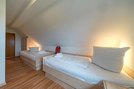 Hus Strandkieker Hus Strandkieker 08 Schillig - Schlafzimmer mit zwei Einzelbetten