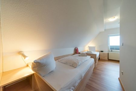 Hus Strandkieker Hus Strandkieker 08 Schillig - Schlafzimmer mit zwei Einzelbetten