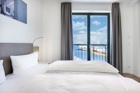 Krusespeicher Krusespeicher 5-65 Wismar - Schlafzimmer mit Doppelbett