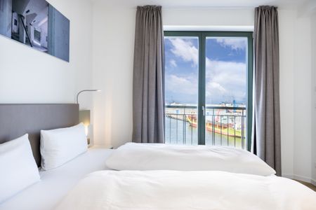 Krusespeicher Krusespeicher 5-67 Wismar - Schlafzimmer mit Doppelbett