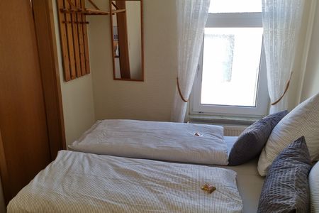 Haus Borkumitte Appartement Thor Haus Borkumitte - kleines Schlafzimmer mit 1,40 Bett