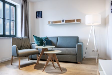 Krusespeicher Krusespeicher 5-60 Wismar - Wohn-Essbereich mit Couch