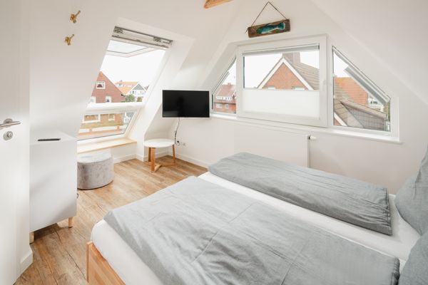  Haus Erika Fewo Süd-Ost Norderney - Schlafzimmer