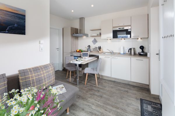  Ferienwohnung Vissers Seehstern Norderney - Wohnzimmer