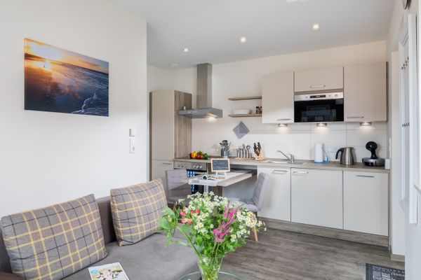  Ferienwohnung Vissers Seehstern Norderney - Wohnzimmer