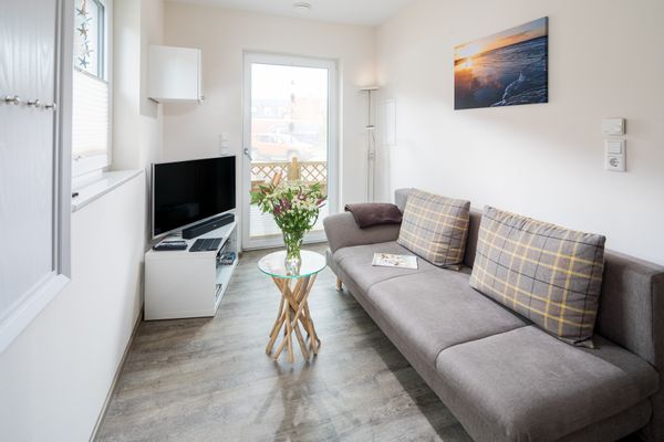  Ferienwohnung Vissers Seehstern Norderney - Wohnzimmer