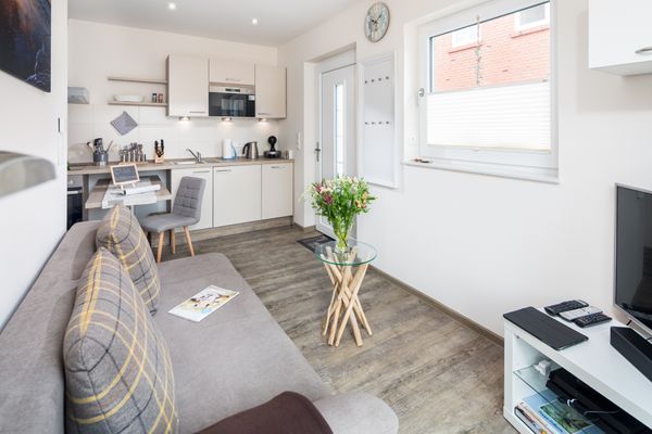  Ferienwohnung Vissers Seehstern Norderney - Wohnzimmer