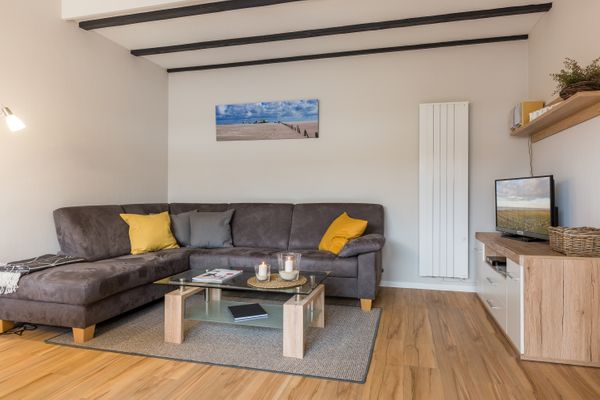  Wohnung Seeschwalbe Dorf - Wohnzimmer