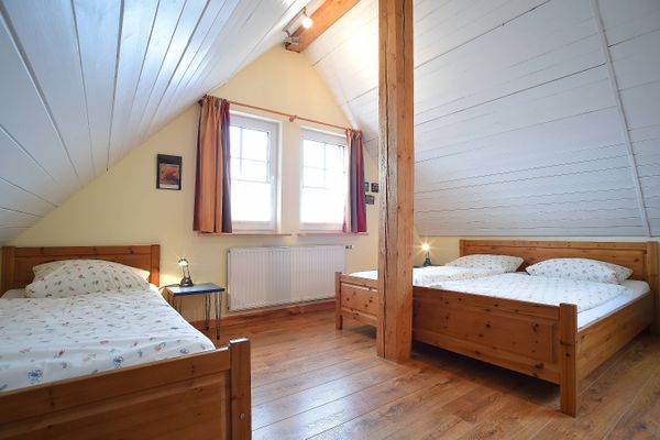 Haus am Spielplatz Taube Schmallenberg - Schlafzimmer Wohnung Taube