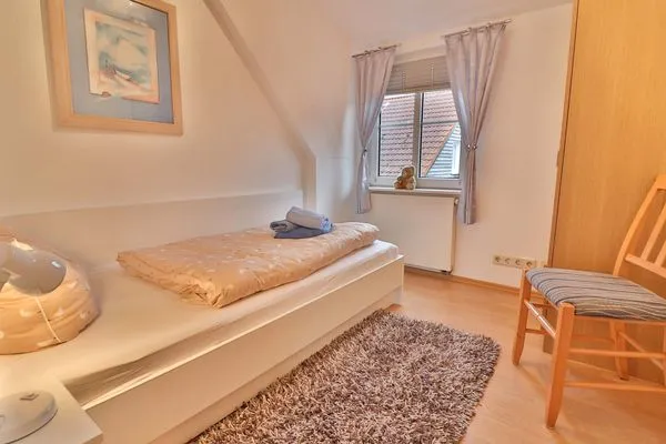 Schlafzimmer  Kiek rin bi Kati - Ferienwohnung 4