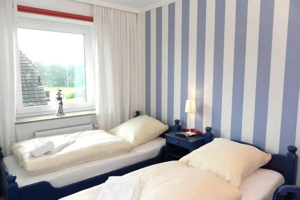 Schlafzimmer in der Ferienwohnung Jessen´s Wattblick in Wittdün auf Amrum  Ferienwohnung *Jessen´s Wattblick*