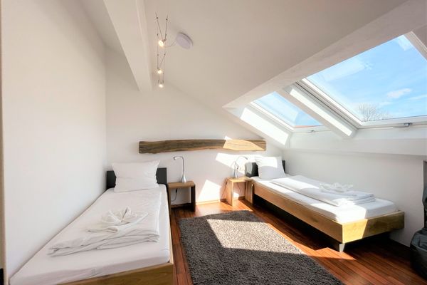 Ferienanlage Neuschwansteinblick Ferienwohnung 127 Ferienwohnungen in Füssen - Schlafzimmer