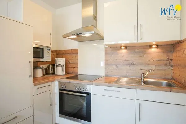 Küche / Küchenzeile Villa van Harten Ferienwohnung Kaptain