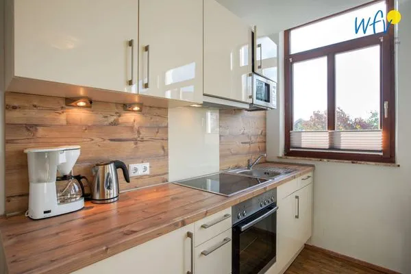 Küche / Küchenzeile Villa van Harten Ferienwohnung Bootsmann