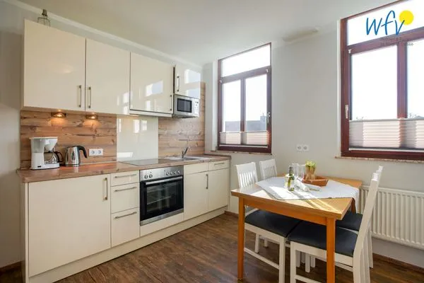 Küche / Küchenzeile Villa van Harten Ferienwohnung Bootsmann