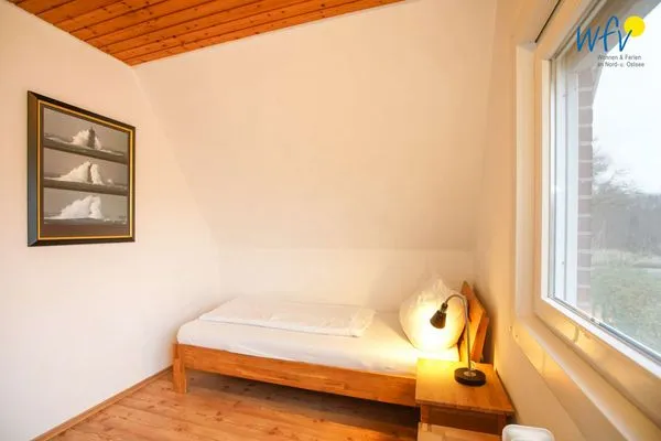 Schlafzimmer Ferienhaus Seehundje Ferienwohnung 21