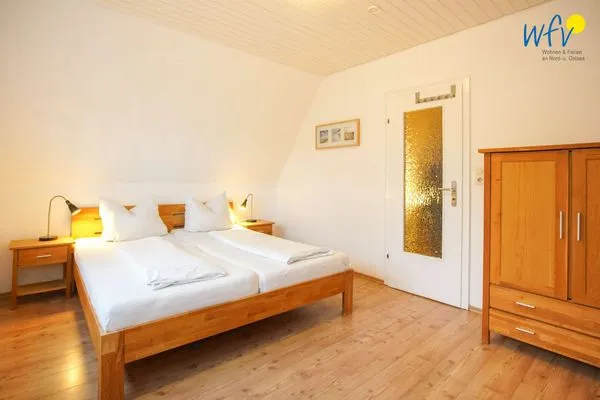 Schlafzimmer Ferienhaus Seehundje Ferienwohnung 21