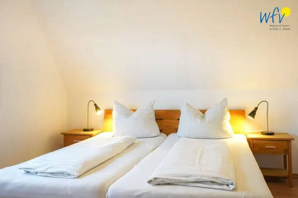 Schlafzimmer Ferienhaus Seehundje Ferienwohnung 21