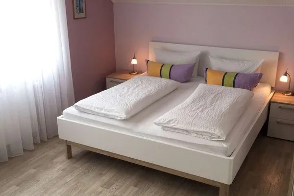 Schlafzimmer Ferienhaus Kiebitzdüne Ferienwohnung Auster