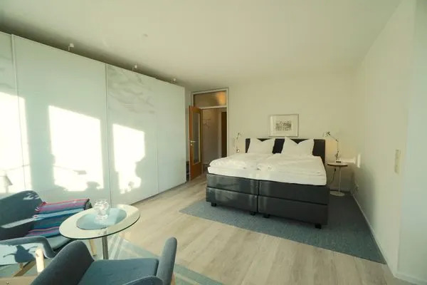 Wohnzimmer  Ferienwohnung Strandhüpfer - direkt am Meer