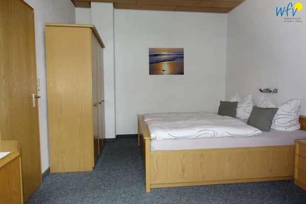 Schlafzimmer Stine's Hus Ferienwohnung 1