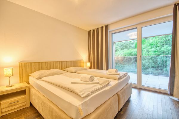 Alpin & Seeresort Penthouse 21 Zell am See - Schlafzimmer