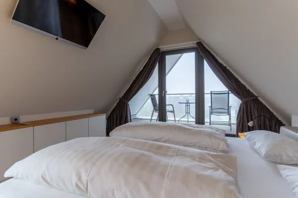 Ferienhaus Kirchenstraße Appartement Achtern Diek OG SPO Ording - 