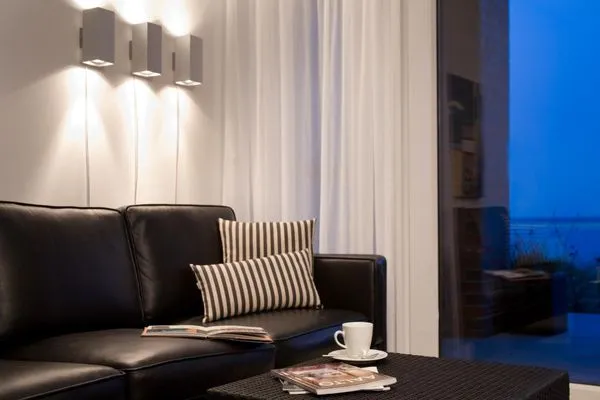 Sofa und Meerblick in der Ferienwohnung Aalto in Wittdün auf Amrum Amrumer Welle Ferienwohnung „Aalto"