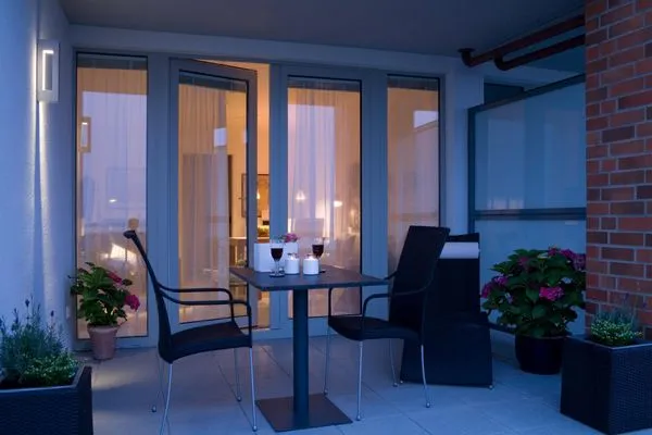 Abenddämmerung auf der Terrasse der Ferienwohnung Aalto in Wittdün auf Amrum Amrumer Welle Ferienwohnung „Aalto"