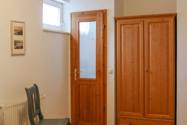 Schlafzimmer Weisses Rössl Ferienwohnung Wellenreiter