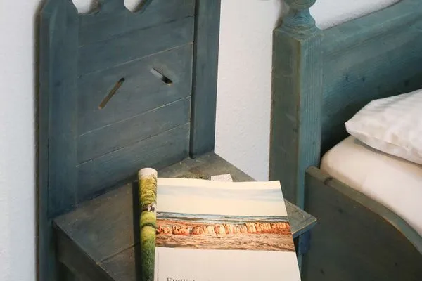 Schlafzimmer Weisses Rössl Ferienwohnung Seepferdchen