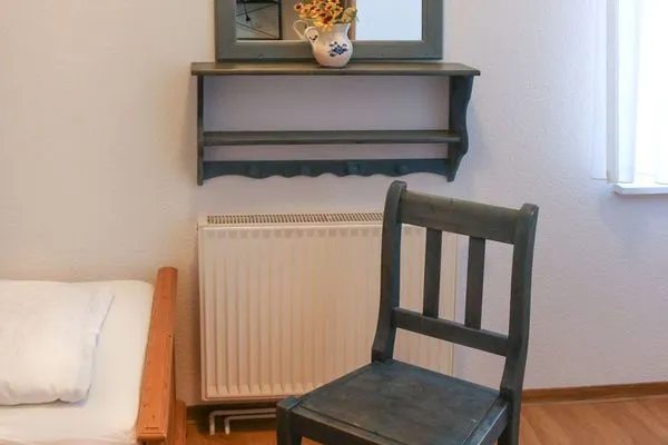 Schlafzimmer Weisses Rössl Ferienwohnung Seepferdchen