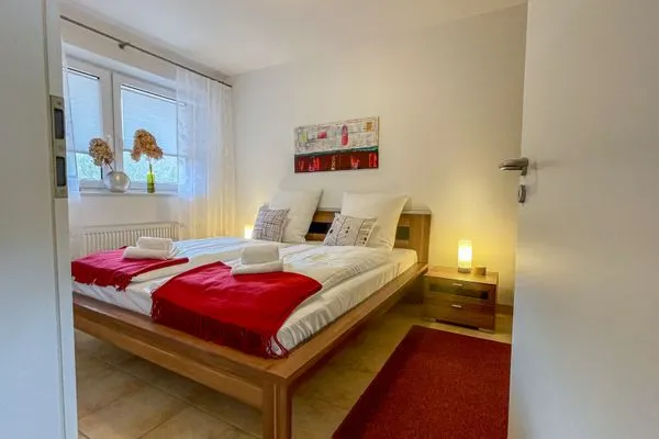 Haus am Waldbad FeWo Westwind 4 Sahlenburg - Schlafzimmer