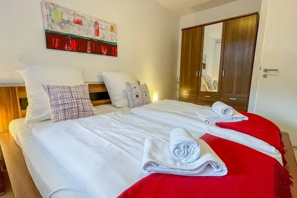 Haus am Waldbad FeWo Westwind 4 Sahlenburg - Schlafzimmer