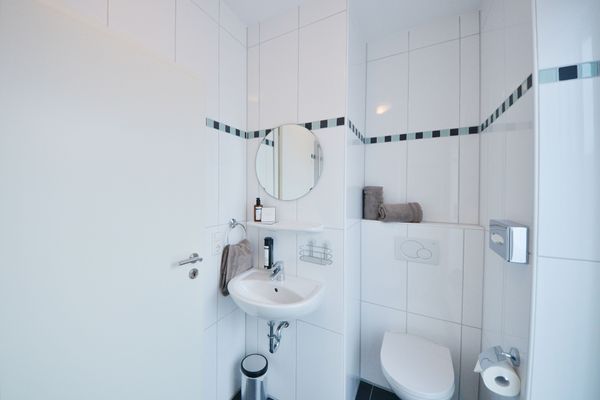  Ferienwohnung Mittelpunkt - Haus Mittelpunkt Wangerooge - Badezimmer