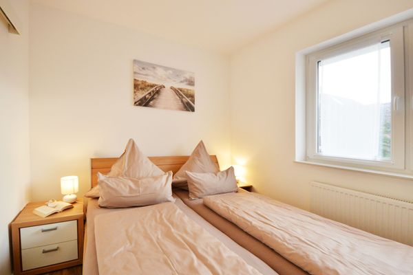  Ferienwohnung Mittelpunkt - Haus Mittelpunkt Wangerooge - Schlafzimmer
