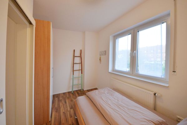  Ferienwohnung Mittelpunkt - Haus Mittelpunkt Wangerooge - Schlafzimmer