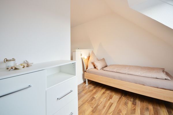  Ferienwohnung Mittelpunkt - Haus Mittelpunkt Wangerooge - Schlafzimmer