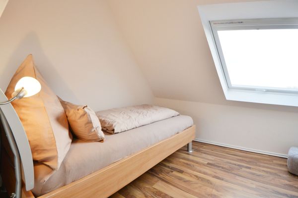  Ferienwohnung Mittelpunkt - Haus Mittelpunkt Wangerooge - Schlafzimmer