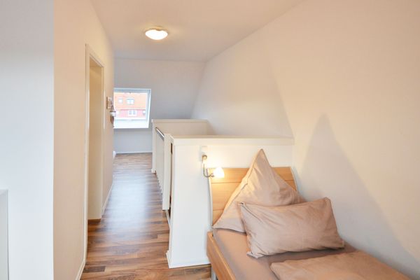  Ferienwohnung Mittelpunkt - Haus Mittelpunkt Wangerooge - Schlafzimmer