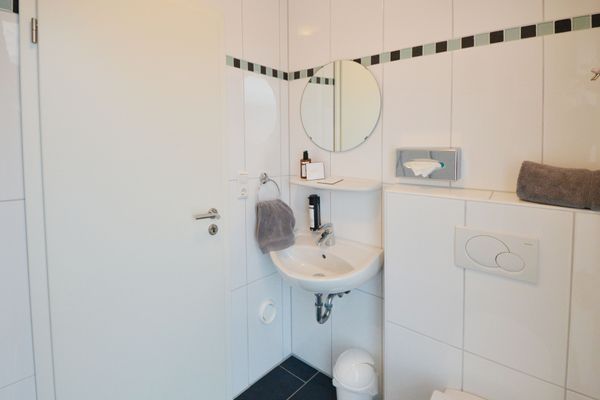  Ferienwohnung Mittelpunkt - Haus Mittelpunkt Wangerooge - Badezimmer